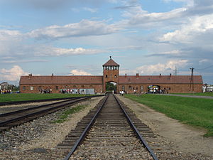 The main gate at the former nazi death camp of...