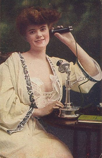 An early 20th century candlestick phone being ...
